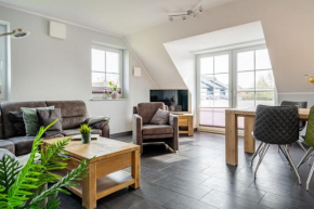 Küstenzeit, Obergeschoss mit Balkon